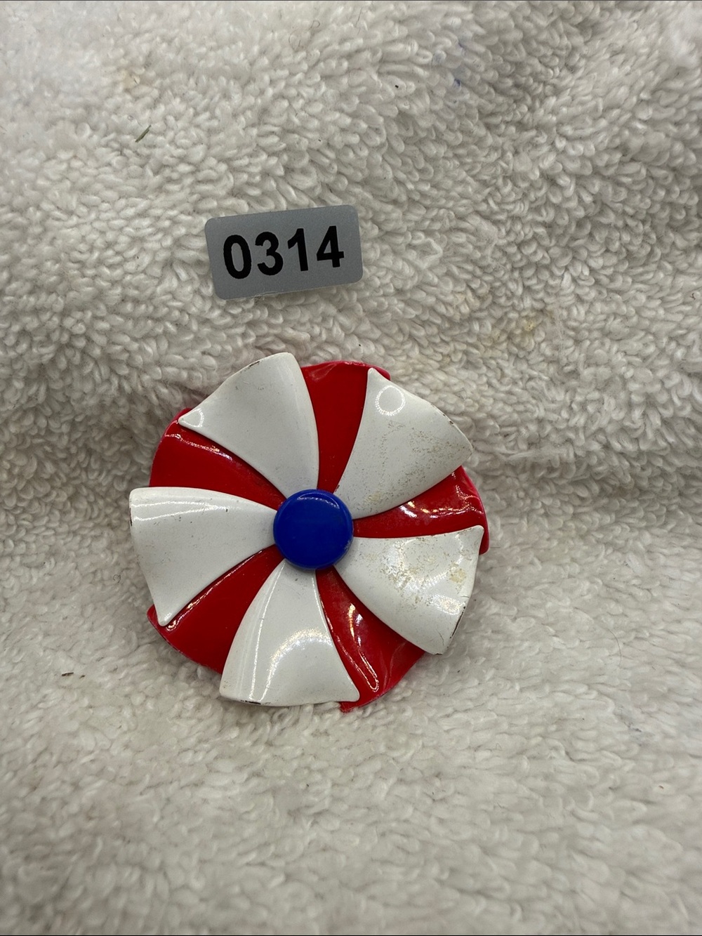Red & White Swirl Brooch with Blue Center